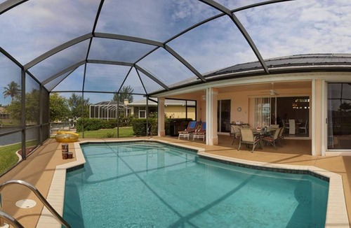 Pelican House | Spacious Waterfront w/Solar Heated Pool Home