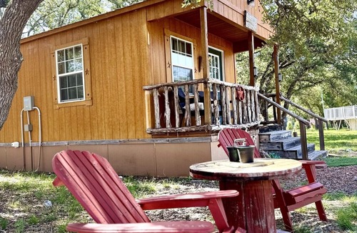 Mountain Home Cabin | The Outpost Cabin- Texas Hill Country Western-themed cabin for 4 in the woods near Kerrville & Fredericksburg