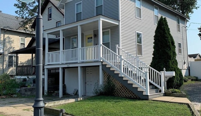 Desirable Beach House & Full Backyard with 6 beachtags. Driveway fits 4 Cars!