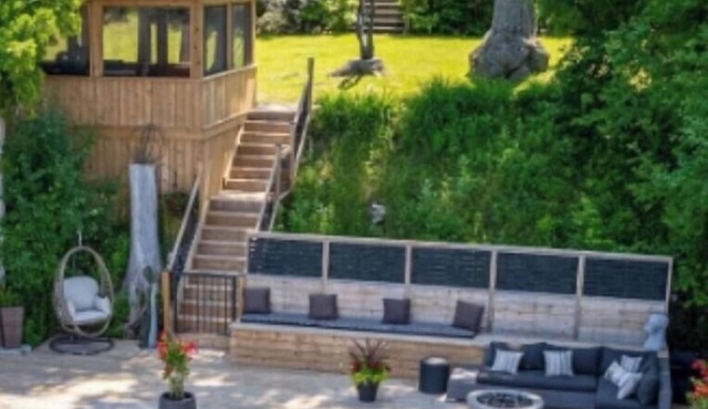 Island retreat on Rice Lake with sunset views, fire pit and fully fenced yard.