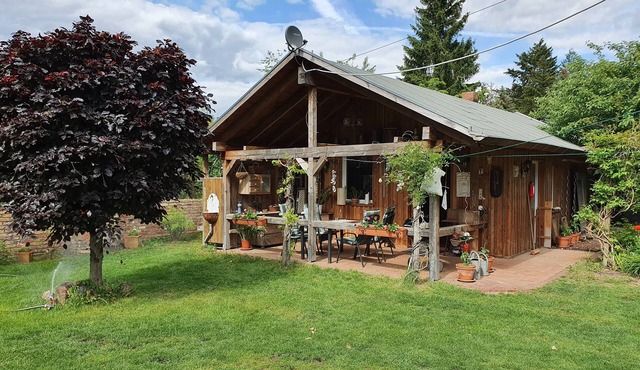 lovingly furnished cottage with terrace in the countryside