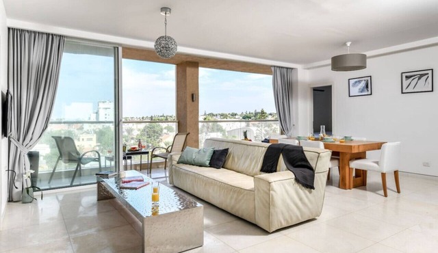 Modern Gem with Stunning Balcony by Sea N Rent