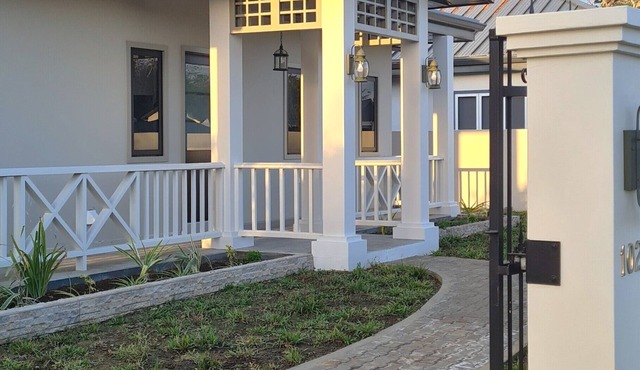 New spacious luxury 4-bedroom villa in gated development close to beaches.