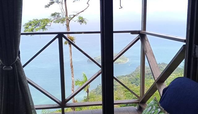 Rustic studio treehouse cabin in Paramin, perfect for quiet mountain-top getaway