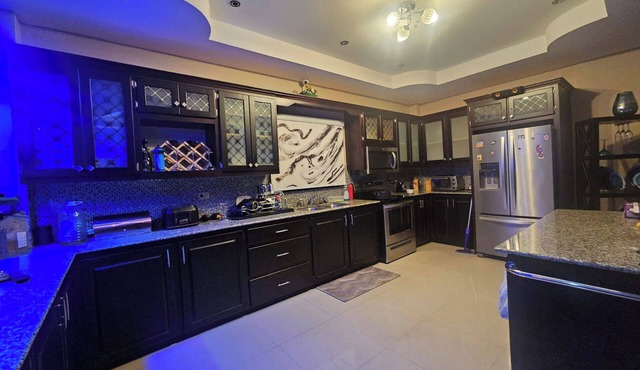 This spacious property features a fully equipped kitchen, and an inviting small pool